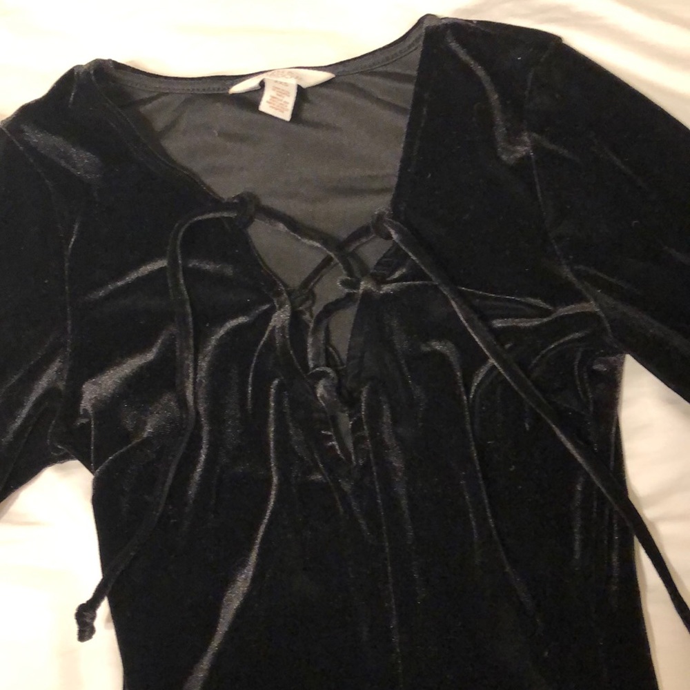 Cute lace up black velvet body suit.
